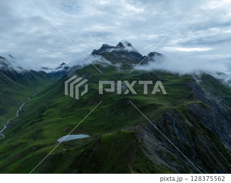 Aerial view of beautiful high altitude grassland mountain landscape 128375562