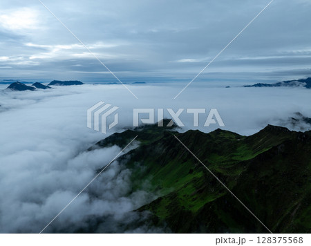 Aerial view of beautiful high altitude grassland mountain landscape Aerial view of beautiful high altitude grassland mountain landscape 128375568