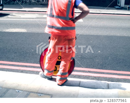 emergency safety rescue workers on asphalt emergency safety rescue workers on asphalt 128377561