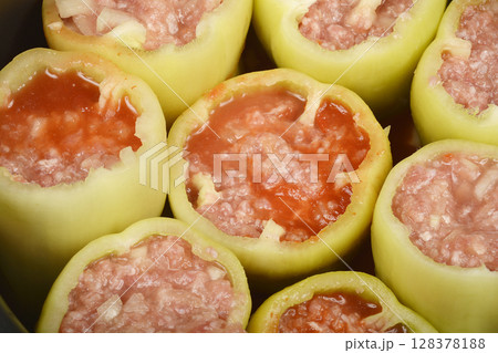 Green bell peppers stuffed with meat and rice mixture Green bell peppers stuffed with meat and rice mixture 128378188
