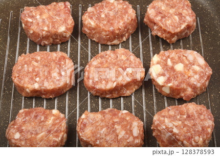 Savory minced meat and cheese patties 128378593