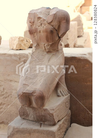 Damaged Ancient Egyptian statue in Karnak Temple Complex, Luxor, Egypt. Damaged Ancient Egyptian statue in Karnak Temple Complex, Luxor, Egypt. 128380824