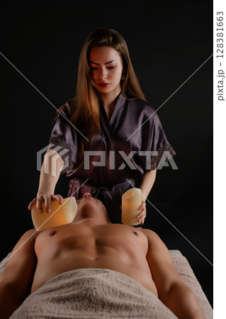 Relaxation and rejuvenation through therapeutic massage in a studio setting 128381663