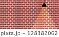 Orange brick wall and orange light from lamp vector. 128382062