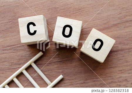 COO Abbreviation on Wooden Cubes Representing Operations Leadership COO Abbreviation on Wooden Cubes Representing Operations Leadership 128382318