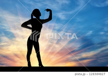 Silhouette of a narcissistic woman showing her finger at yourself 128384827