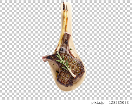 Grilled Lamb Chops Lamb chops seasoned with rosemary, garlic, and lemon zest, then grilled to medium-rare perfection. The meat is 128385058
