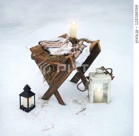 Manger on the snow. Christmas background Manger on the snow. Christmas background 128386566
