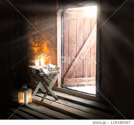 Manger in the barn. Christmas background 128386567