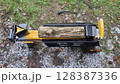 Log splitter preparing to split firewood 128387336