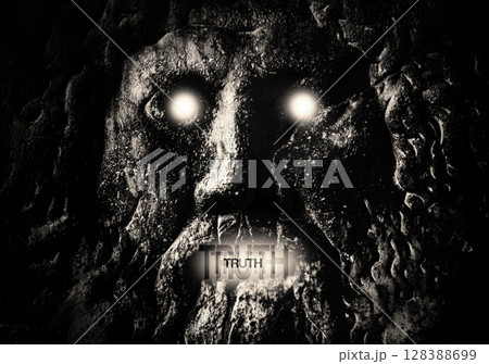Stone face with glowing eyes and the word TRUTH illuminated in its mouth 128388699