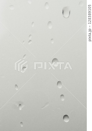 Real water drops on grey transparent background 128389105