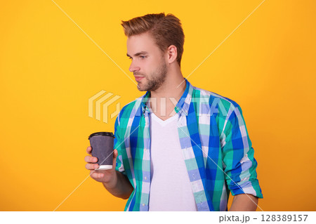 Drinking espresso. Man drinking tea. Warm morning. Coffee break at home. Millennial man having coffee cup isolated on yellow. Morning coffee time. Lifestyle concept. Takeaway drink 128389157