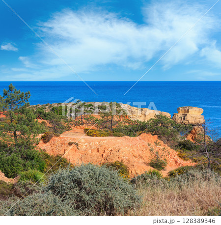 Atlantic rocky coast view (Algarve, Portugal). Atlantic rocky coast view (Algarve, Portugal). 128389346