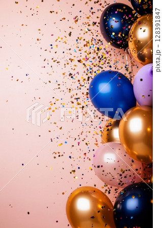 Colorful Balloons and Confetti Create a Festive Atmosphere for a Celebration. Colorful Balloons and Confetti Create a Festive Atmosphere for a Celebration. 128391847