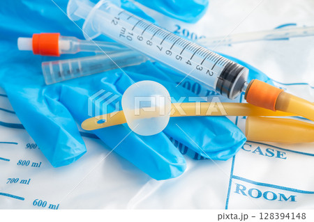 Foley catheter and urine drainage bag collect urine for disability or patient in hospital. Foley catheter and urine drainage bag collect urine for disability or patient in hospital. 128394148