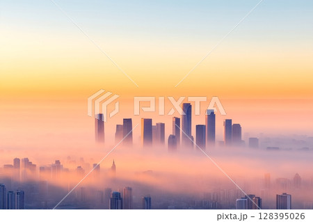 A dense urban skyline partially obscured by a brownish yellow haze creating an atmospheric and moody cityscape during the golden hour 128395026