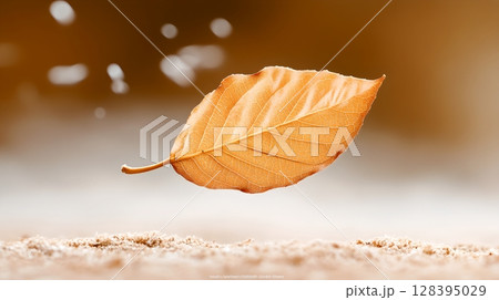 A fragile cracked and weathered autumn leaf floating in a delicate hazy atmosphere conveying a sense of transience and the natural cycle of life A fragile cracked and weathered autumn leaf floating in a delicate hazy atmosphere conveying a sense of transience and the natural cycle of life 128395029