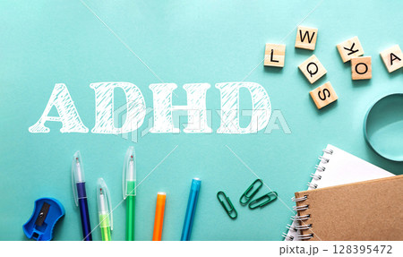 A blue background with a white word written in black 128395472