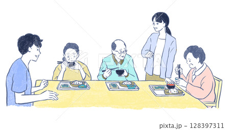福祉・介護：食事をするシニアグループと若い男女スタッフ 128397311