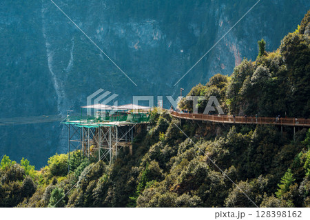 Zip lines stretching across Balagezong mountains in Shangri-la, China 128398162