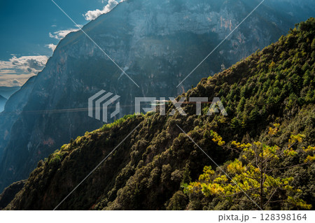 Zip lines stretching across Balagezong mountains in Shangri-la, China 128398164