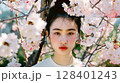 桜に囲まれた美しい日本人女性ポートレート 128401243