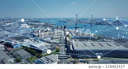 現代都市のドローン空撮風景とデジタルテクノロジーのコンセプト バナー・広告向け横長ビジュアル 現代都市のドローン空撮風景とデジタルテクノロジーのコンセプト バナー・広告向け横長ビジュアル 128401417