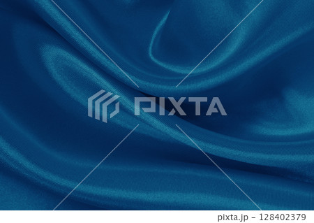 Dark blue fabric cloth texture for background and design art work, beautiful crumpled pattern of silk or linen. 128402379