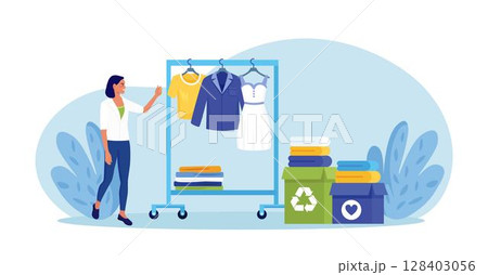Cloth recycling. Woman packing box with clothes at wardrobe for donation. Recycle and sustainable fashion. Eco-friendly production fabric. People donate dress for benefaction. Charity, social care 128403056
