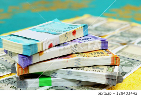 piles of new indian currency notes rupees 50,100,200 and 500 piles of new indian currency notes rupees 50,100,200 and 500 128403442