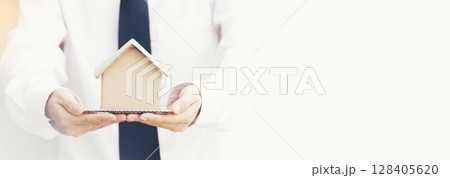 Banner Real estate agent hands holding home business mortgage loan investment property. Banner Hands saving protection home concepts. Insurance Agent sale residence household protection copy space 128405620