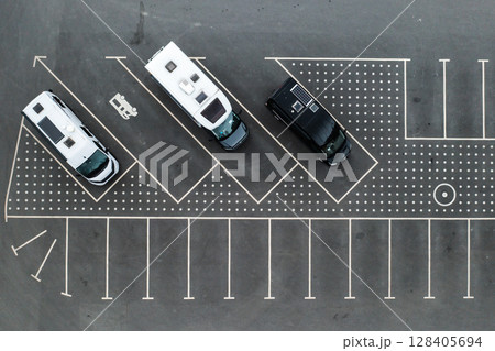 Top view of motorhomes parked in the parking lot. Top view of motorhomes parked in the parking lot. 128405694