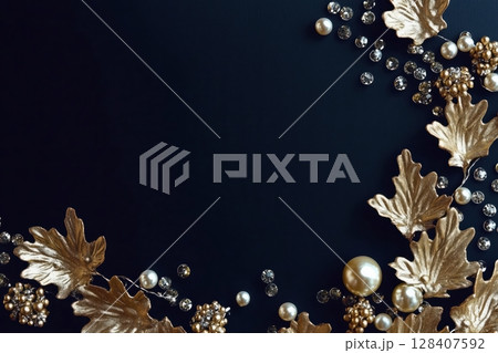 Diamonds and golden leafes on the edges of the picture. Top view 128407592