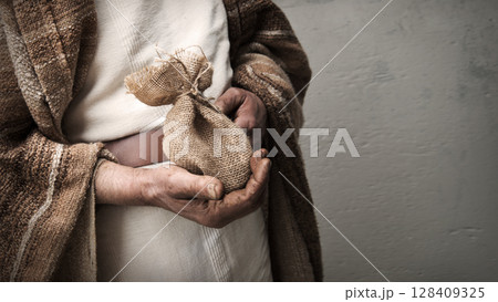 Male hands holding a bag Male hands holding a bag 128409325
