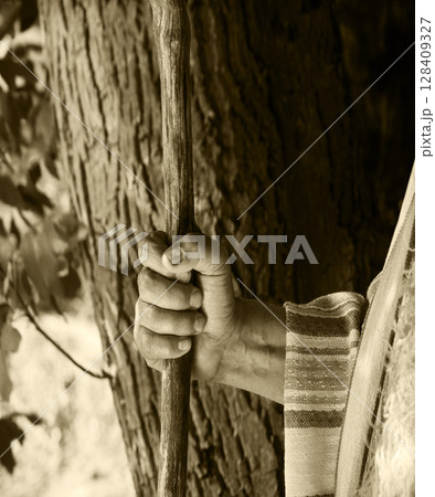 Man's hand with old cane Man's hand with old cane 128409327