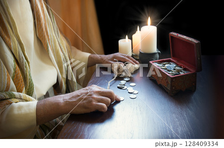 Man collect old silver coins 128409334