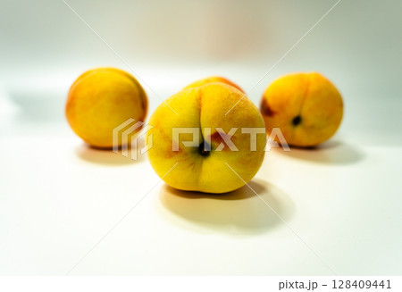 Fresh peaches, isolated on white background 128409441