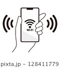 Wi-Fiに接続されたスマートフォンを持つ手のイラスト素材 128411779