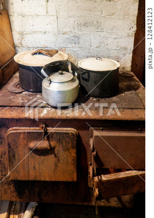 Ancient kitchens - Ancient methods of cooking on stoves. Traditional kitchens in ancient times. Ancient kitchens - Ancient methods of cooking on stoves. Traditional kitchens in ancient times. 128412123