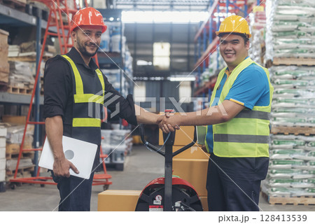 Teamwork Warehouse worker shakehand together. Engineer man hands partnership. Diversity Coworker Men logistics Warehouse teams handshake. Multiracial Support team greeting person teamwork colleagues Teamwork Warehouse worker shakehand together. Engineer man hands partnership. Diversity Coworker Men logistics Warehouse teams handshake. Multiracial Support team greeting person teamwork colleagues 128413539