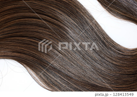 brown hair on white background brown hair on white background 128413549