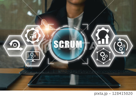 A business professional interacts with a digital scrum interface, showcasing agile project management and teamwork concepts. 128415020