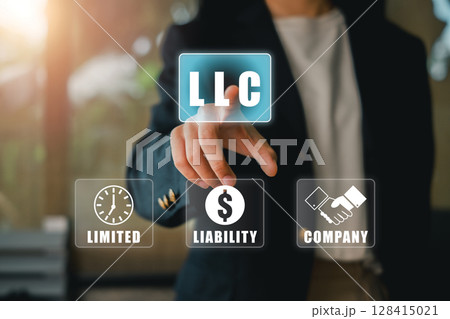 Businessman interacting with virtual LLC icon, symbolizing limited liability company in a digital business setting. 128415021