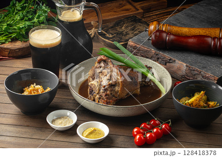 Pork knuckle with sauces cabbage and potatoes 128418378