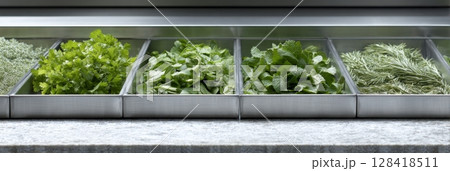 Fresh herbs and fruits are neatly arranged on dehydrator trays in a stylish kitchen setting 128418511