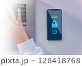 security app lock key icon on smartphone with working man  128418768