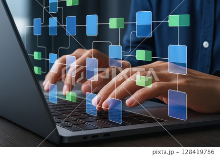 Person is typing on a laptop with a complex network of squares 128419786