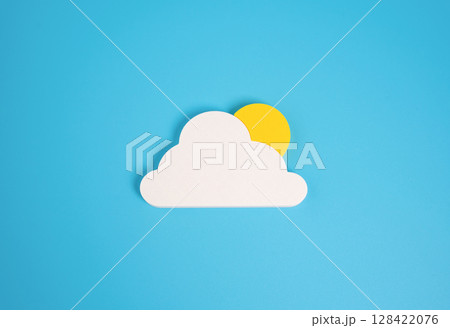 Sun behind the cloud, minimalistic concept. Weather, partly cloudy. Changing weather, partly sunny forecasts, or metaphorical uncertainty. Mood swings, unpredictable outcomes Sun behind the cloud, minimalistic concept. Weather, partly cloudy. Changing weather, partly sunny forecasts, or metaphorical uncertainty. Mood swings, unpredictable outcomes 128422076