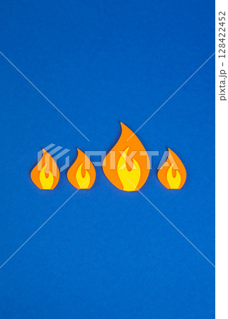 One torch of fire is stronger than the rest. The concept of the loudest trend that covers the others. Viral nature of attention economy. Media focus One torch of fire is stronger than the rest. The concept of the loudest trend that covers the others. Viral nature of attention economy. Media focus 128422452